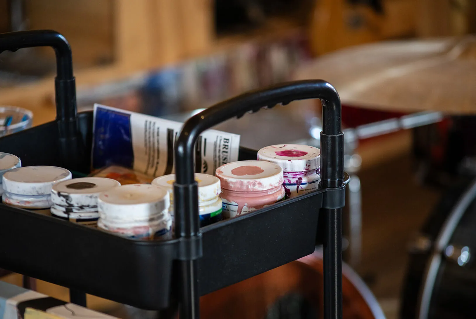 Cart with paint containers